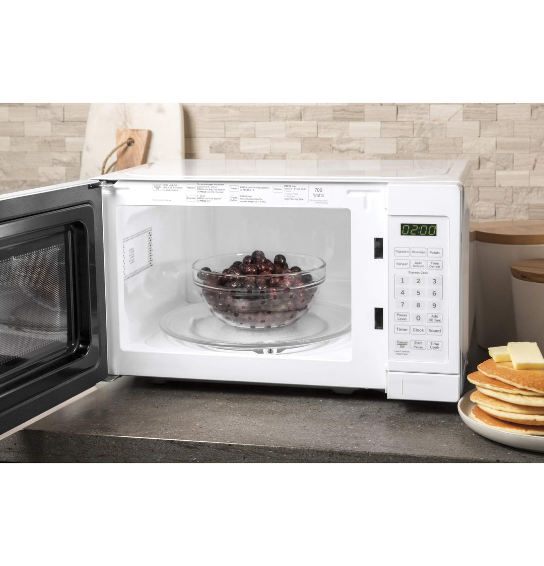 GE Countertop Microwave Oven | 0.7 Cubic Feet Capacity, 700 Watts | Kitchen Essentials for the Countertop or Dorm Room | White